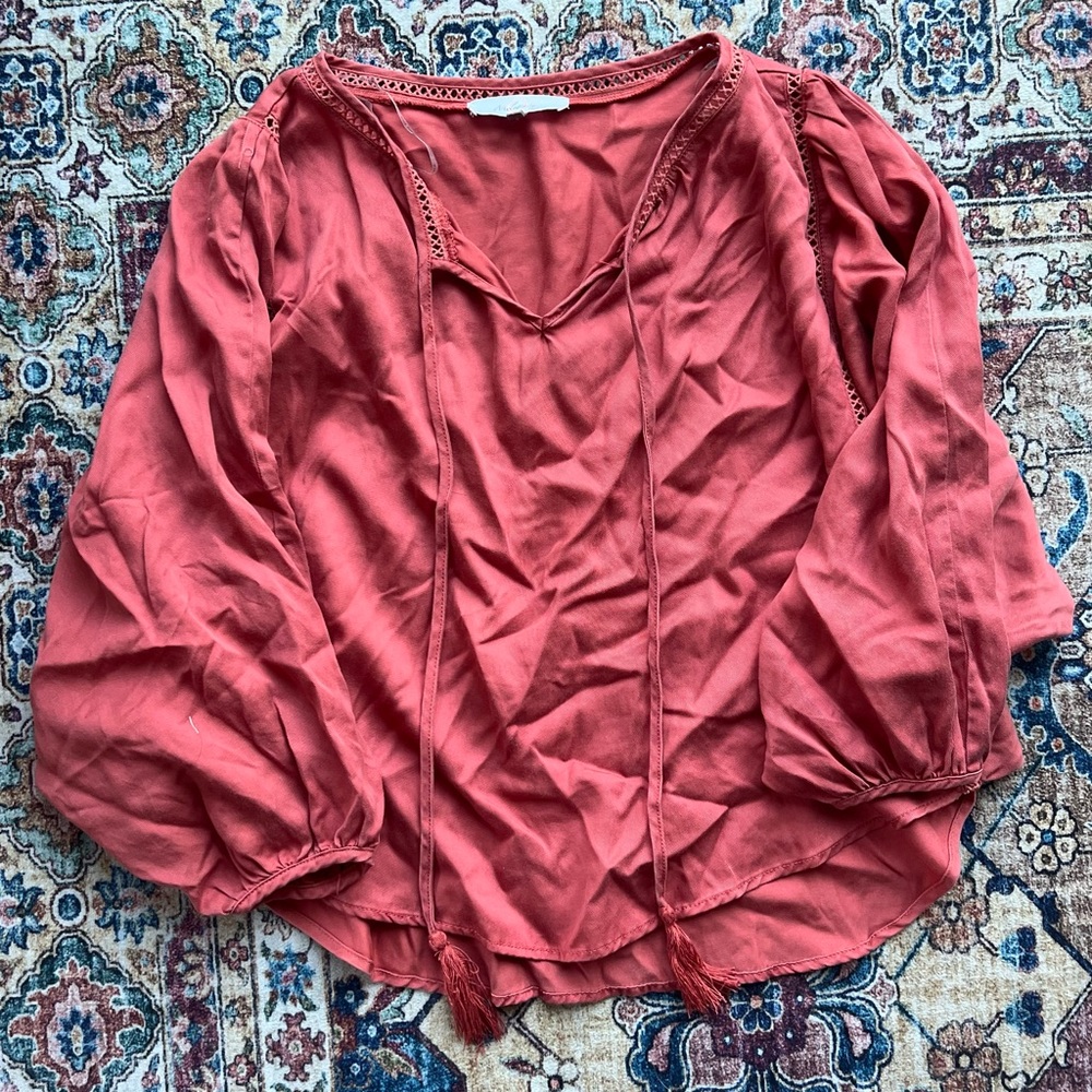 Elegant Red Blouse with Tassel Details
*Free Add-on*